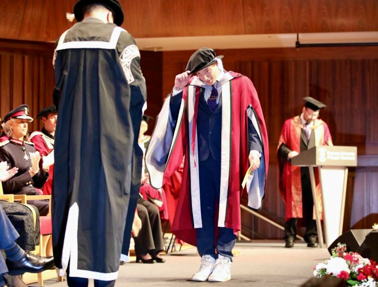 From Garage Supercomputers to a PhD